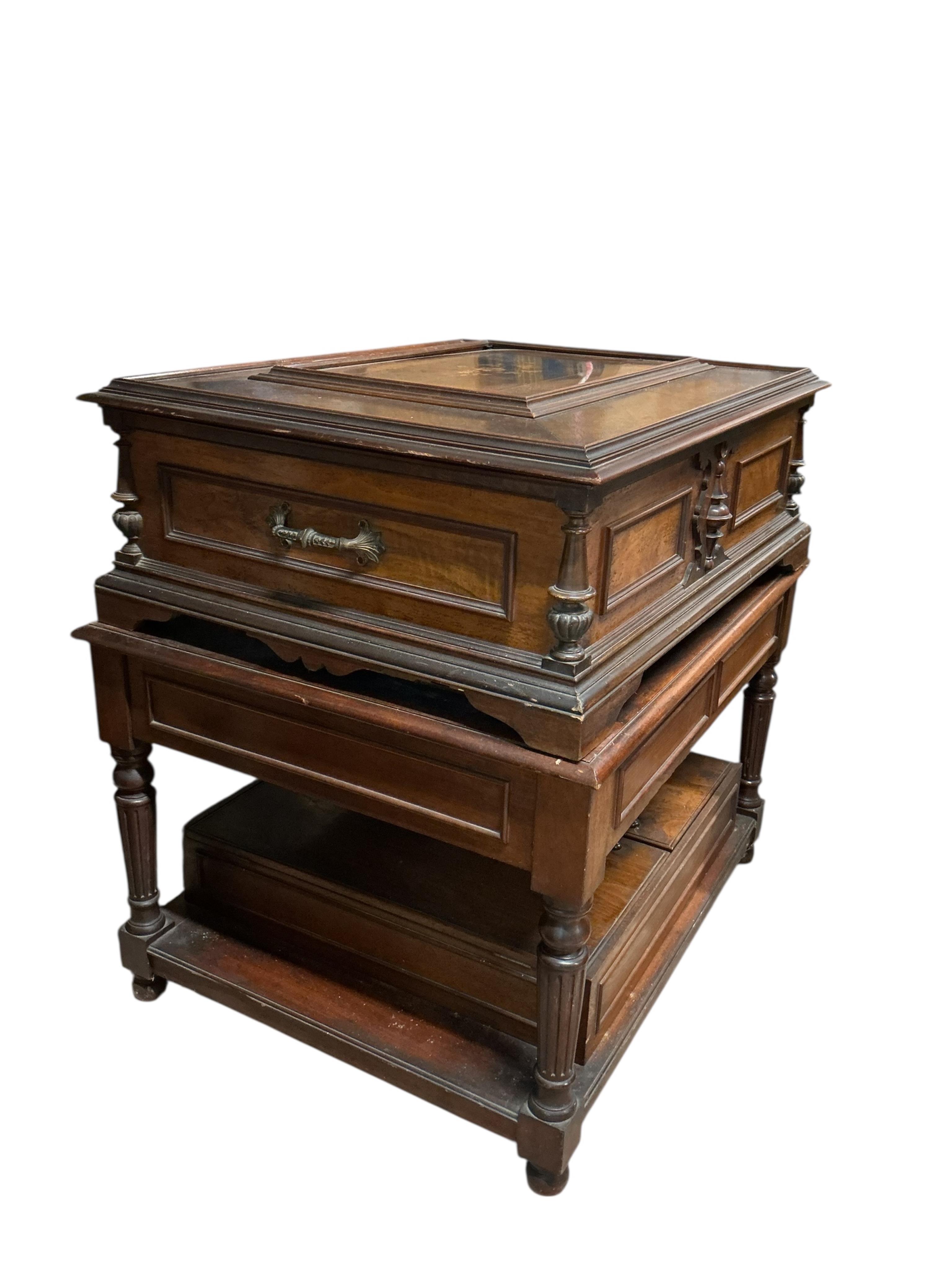A substantial early 20th century inlaid walnut cased tabletop Orpheus polyphon on a floor standing base containing a compartment for storing the discs, together with thirty-seven 57.5cm diameter discs, and a winding hand